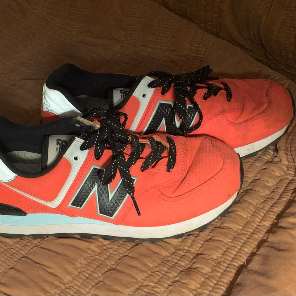 New Balance Vibrant Coral and Black Sneakers